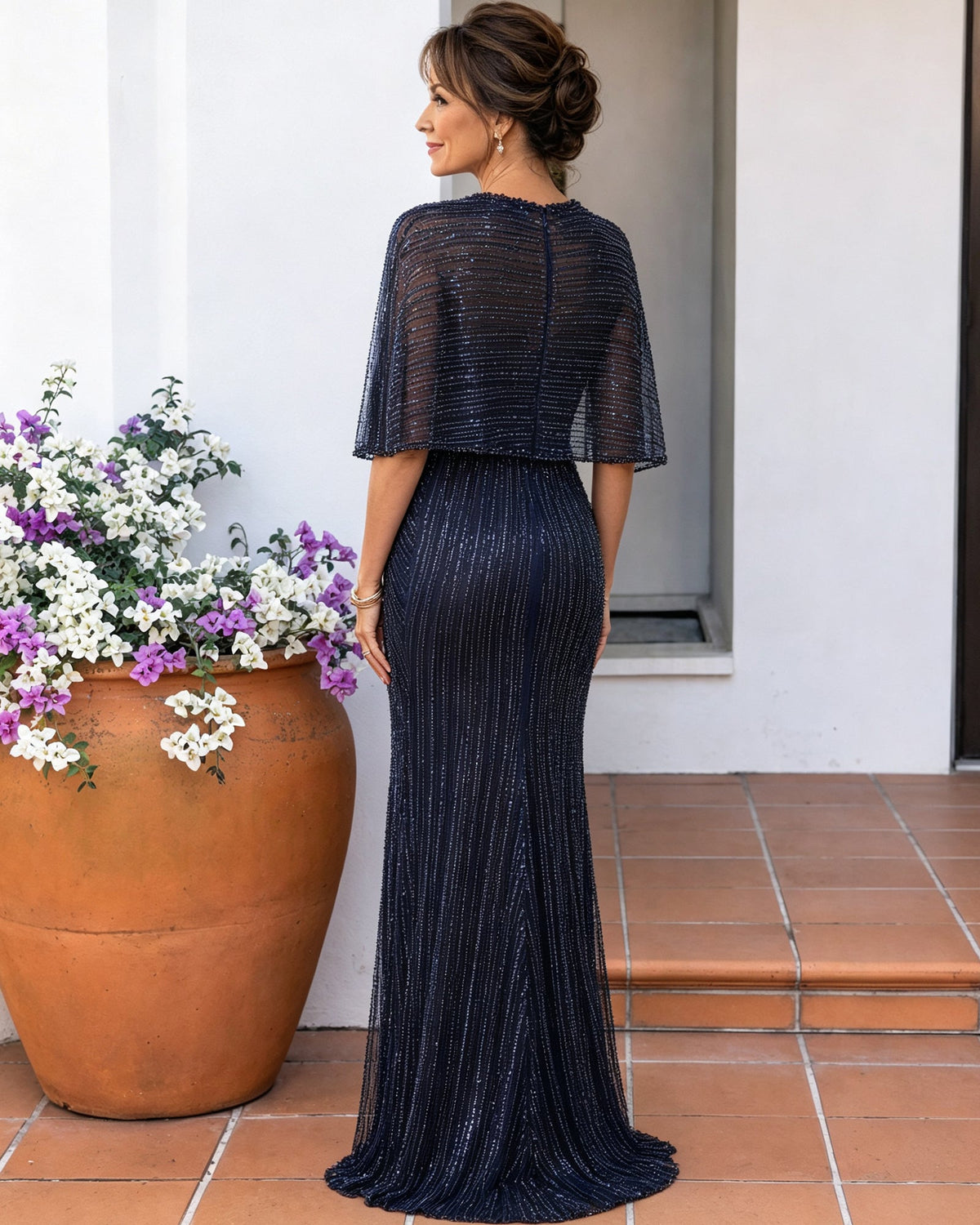 Navy beaded stripe dress with sheer cape sleeves, column silhouette