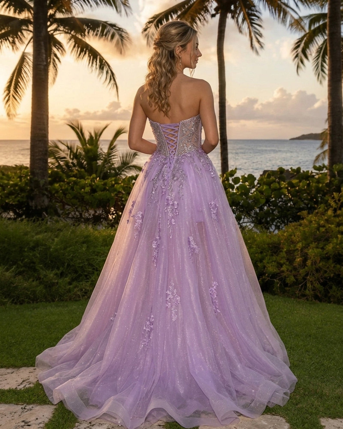 Lavender strapless prom dress with corset bodice and open-back tulle skirt, thigh slit
