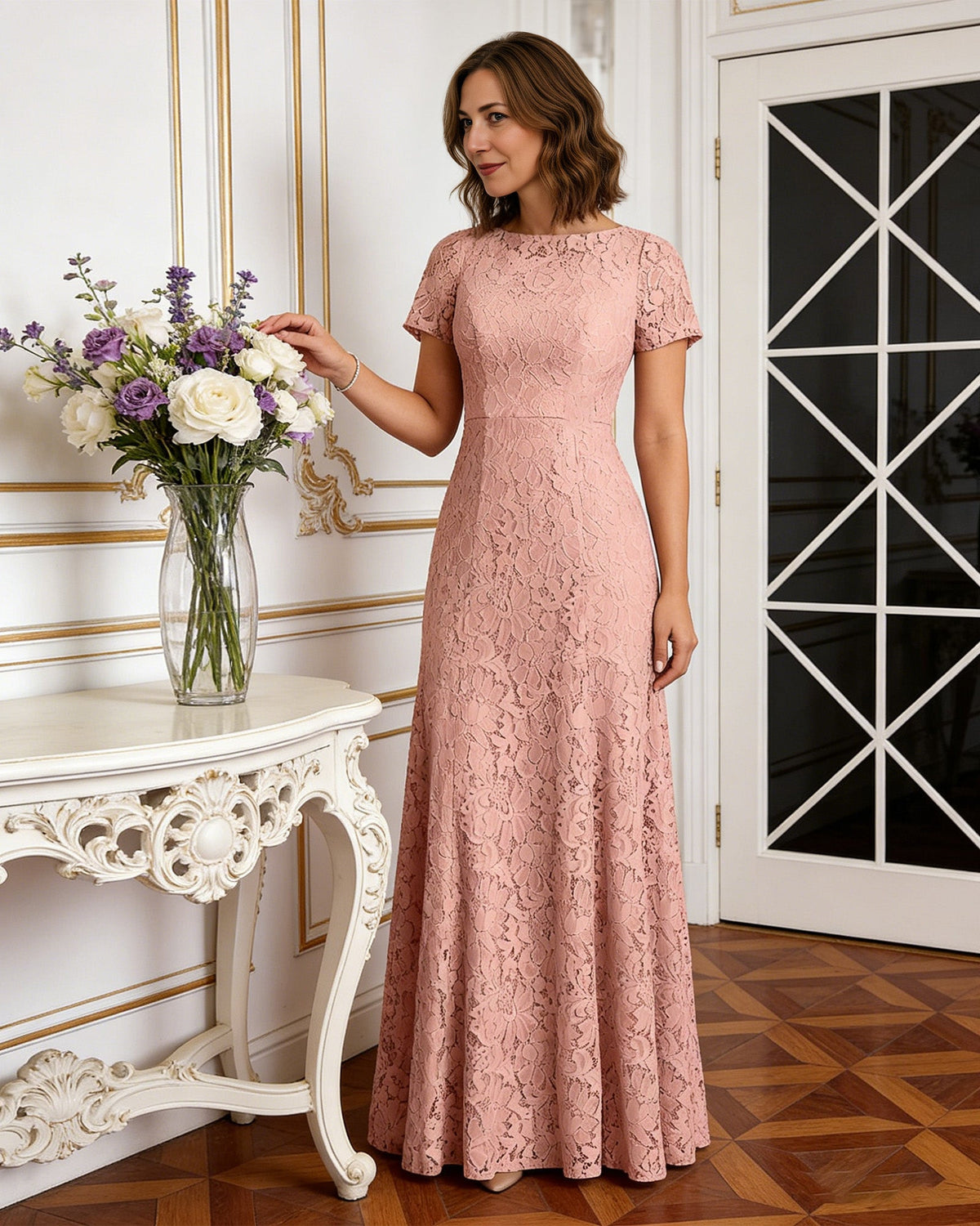 long lace mother of the bride mermaid dress with crew neckline and short sleeves shown in formal wedding guest styling