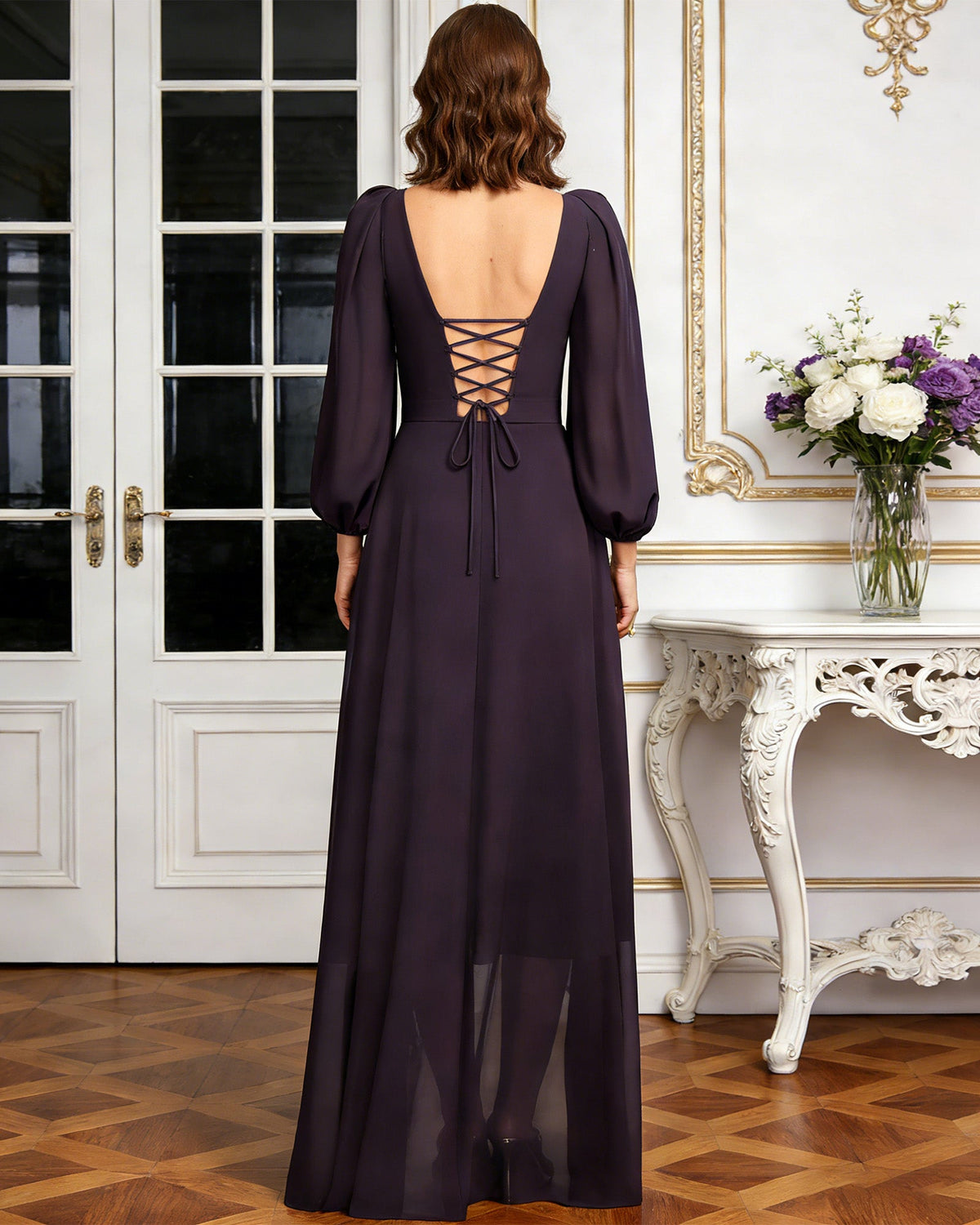 high low mother of the bride dress with lace bodice, chiffon jacket sleeves, tie waist, and layered skirt shown in formal wedding guest styling