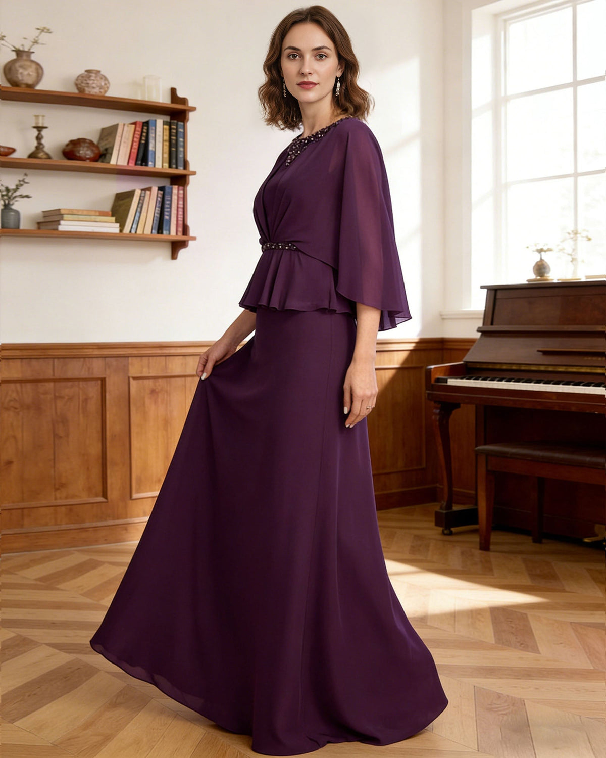 Purple long chiffon capelet dress with beaded neckline and layered peplum ruffle at waist.