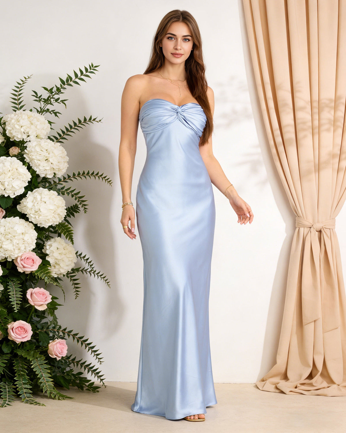 Light blue satin strapless sweetheart bridesmaid dress with twisted center bodice, maxi