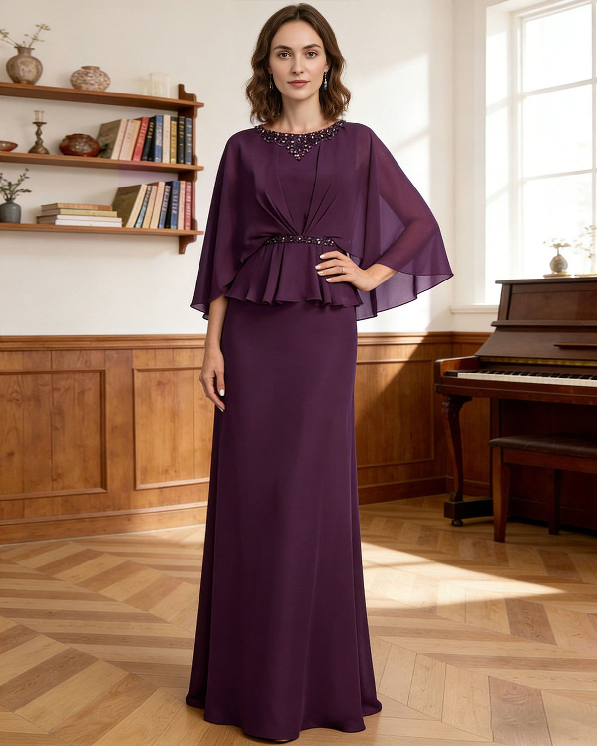 Purple formal gown with beaded neckline, draped capelet sleeves, and peplum waist ruffle.