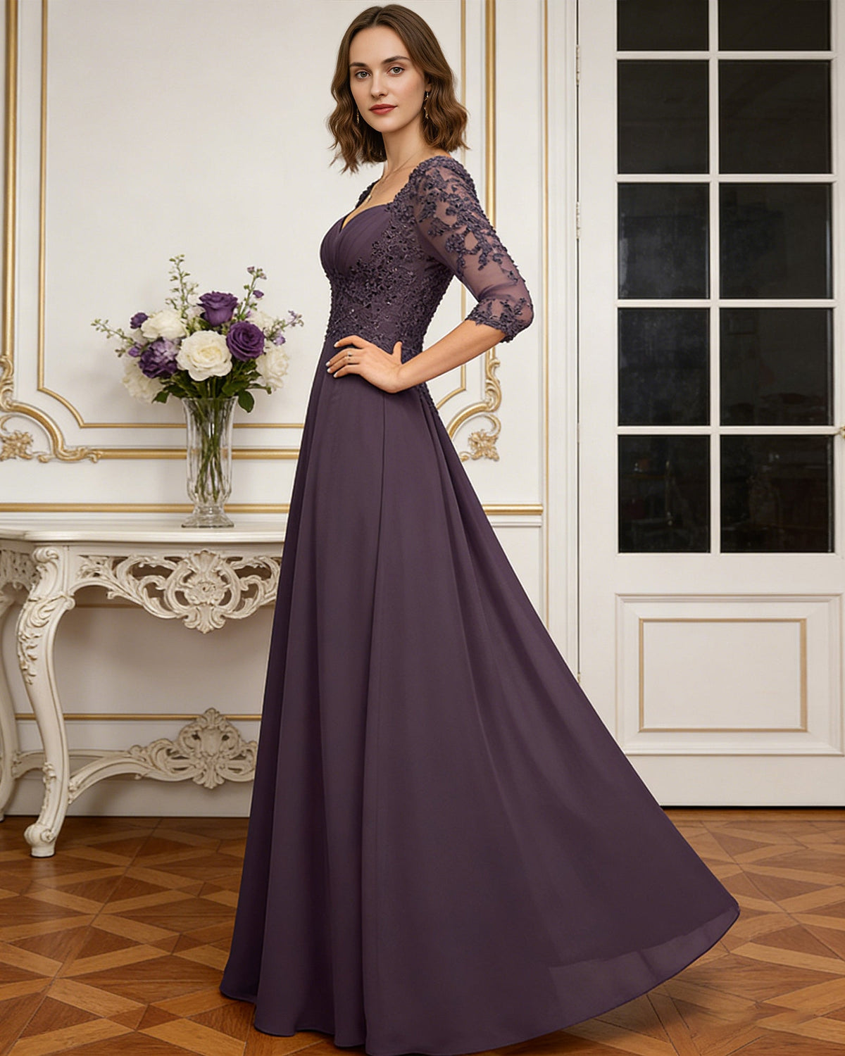 long sweetheart mother of the bride dress with lace three-quarter sleeves and flowing chiffon A-line skirt front detail highlighting neckline, sleeves, waist, and fabric
