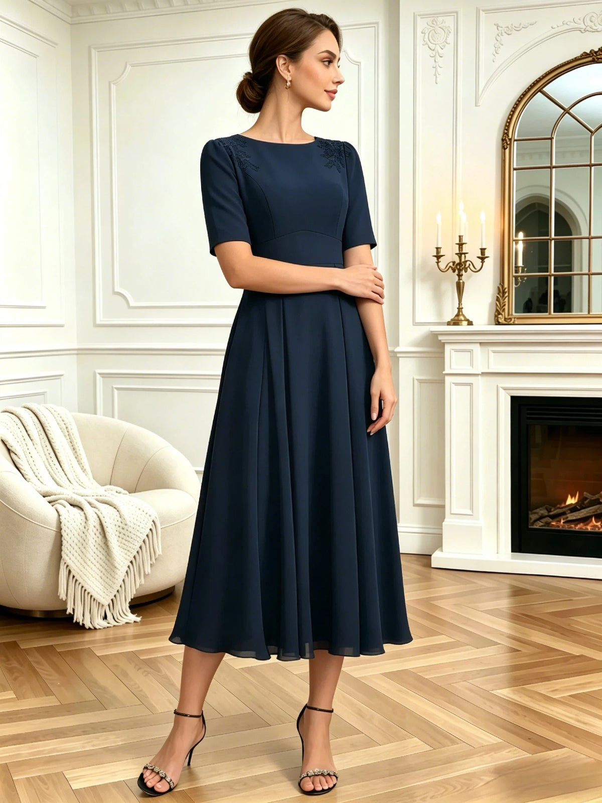 tea length mother of the bride dress with jewel neckline, short sleeves, A-line skirt, and shoulder embroidery front detail highlighting the neckline, waist, and sleeves
