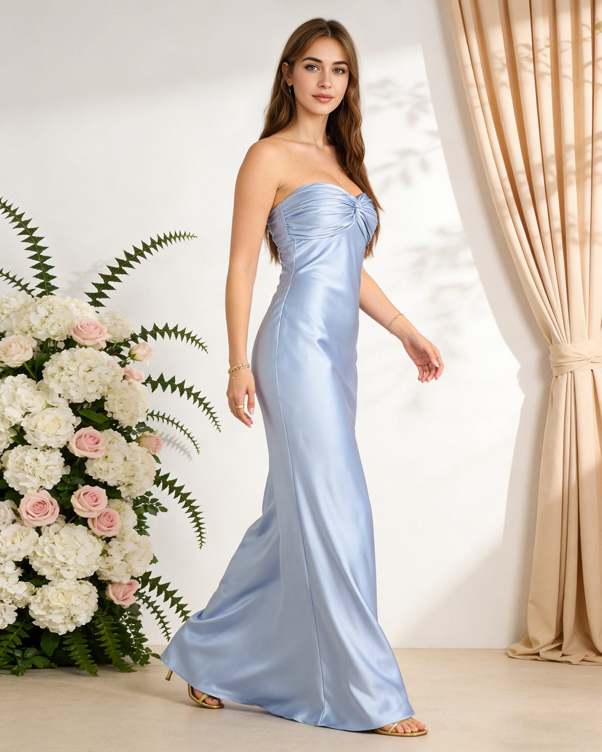 Light blue satin strapless bridesmaid dress with twisted sweetheart bodice, floor-length