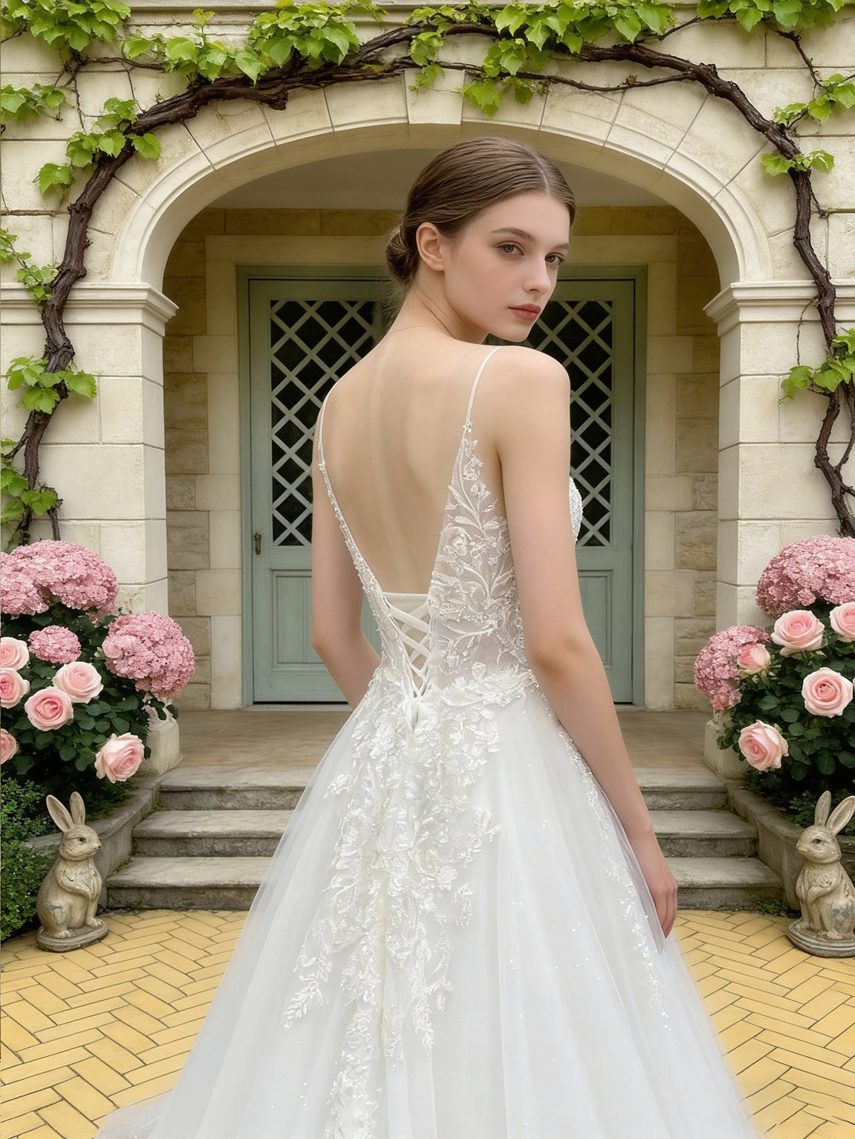 White lace backless wedding dress with spaghetti straps and full tulle ball skirt