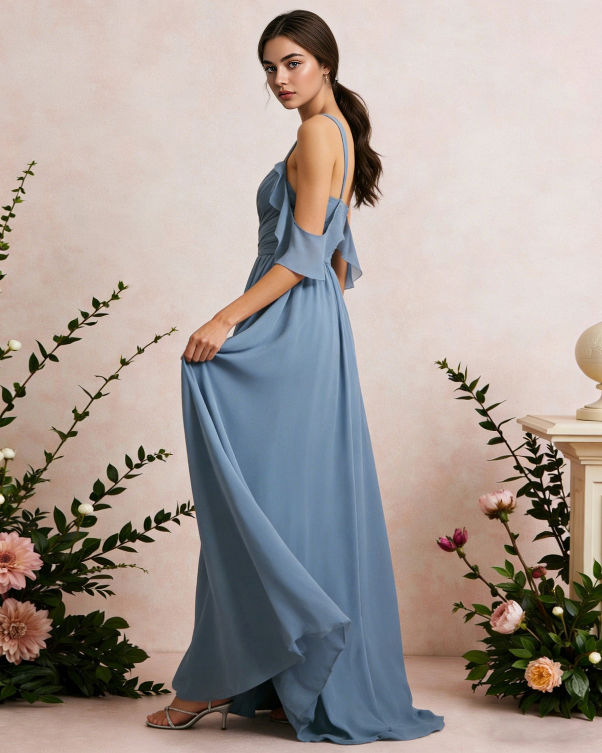 Sky-blue chiffon cold-shoulder maxi dress with V-neck straps and draped sleeve overlay, side view