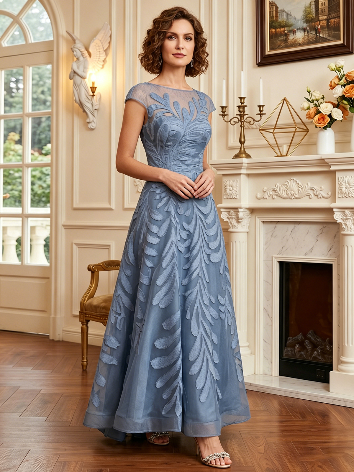 long embroidered tulle mother of the bride A-line dress with illusion neckline and cap sleeves alternate angle showing fabric drape and occasion-ready fit