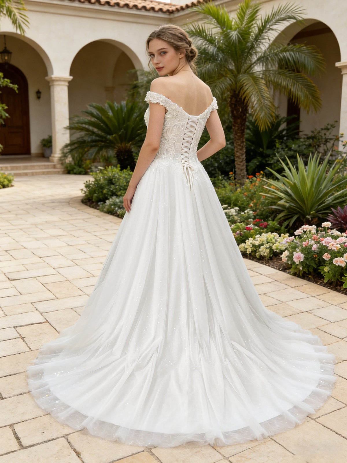 White lace tulle A-line wedding dress with off-shoulder lace bodice, flowing skirt