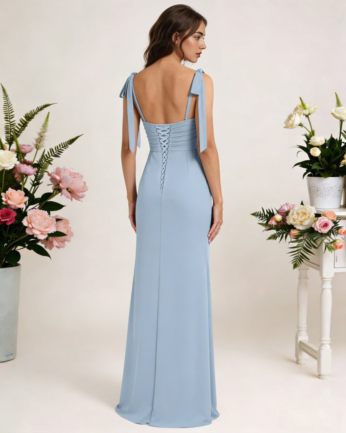 Light blue chiffon bridesmaid dress, open back with lace-up detail and high slit
