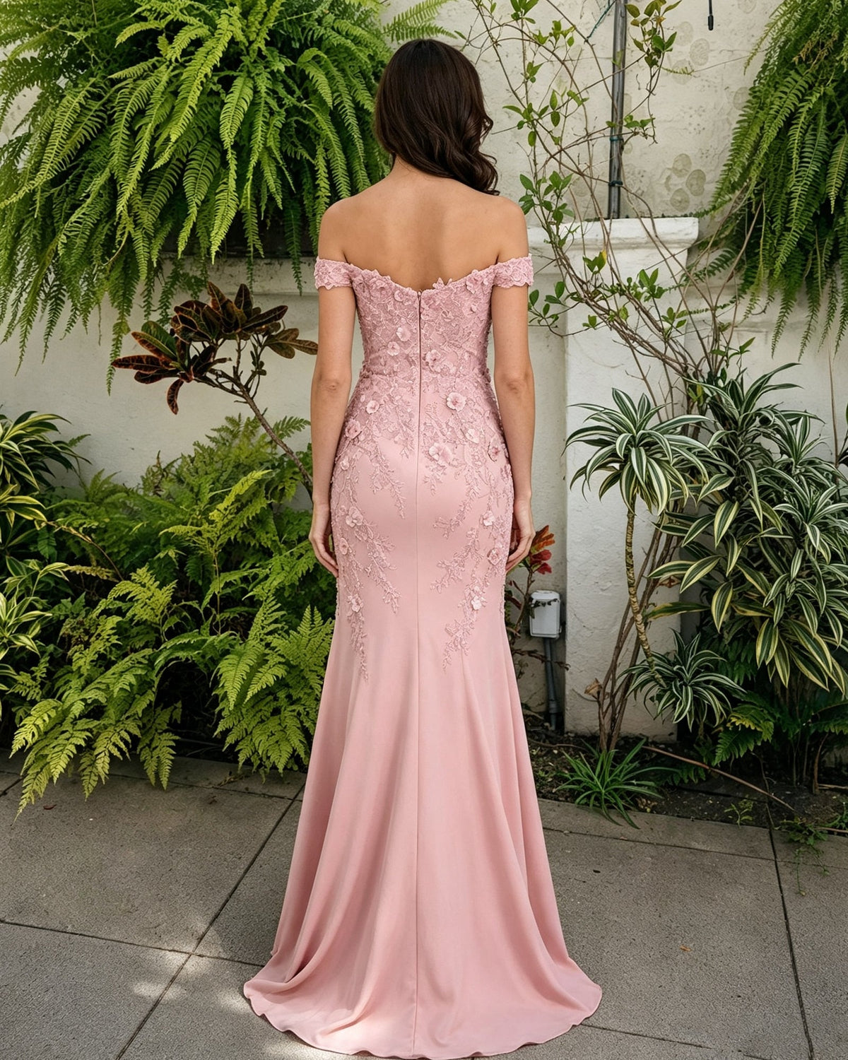 Blush pink off-shoulder lace mermaid gown, back view with fitted seams and sweep skirt