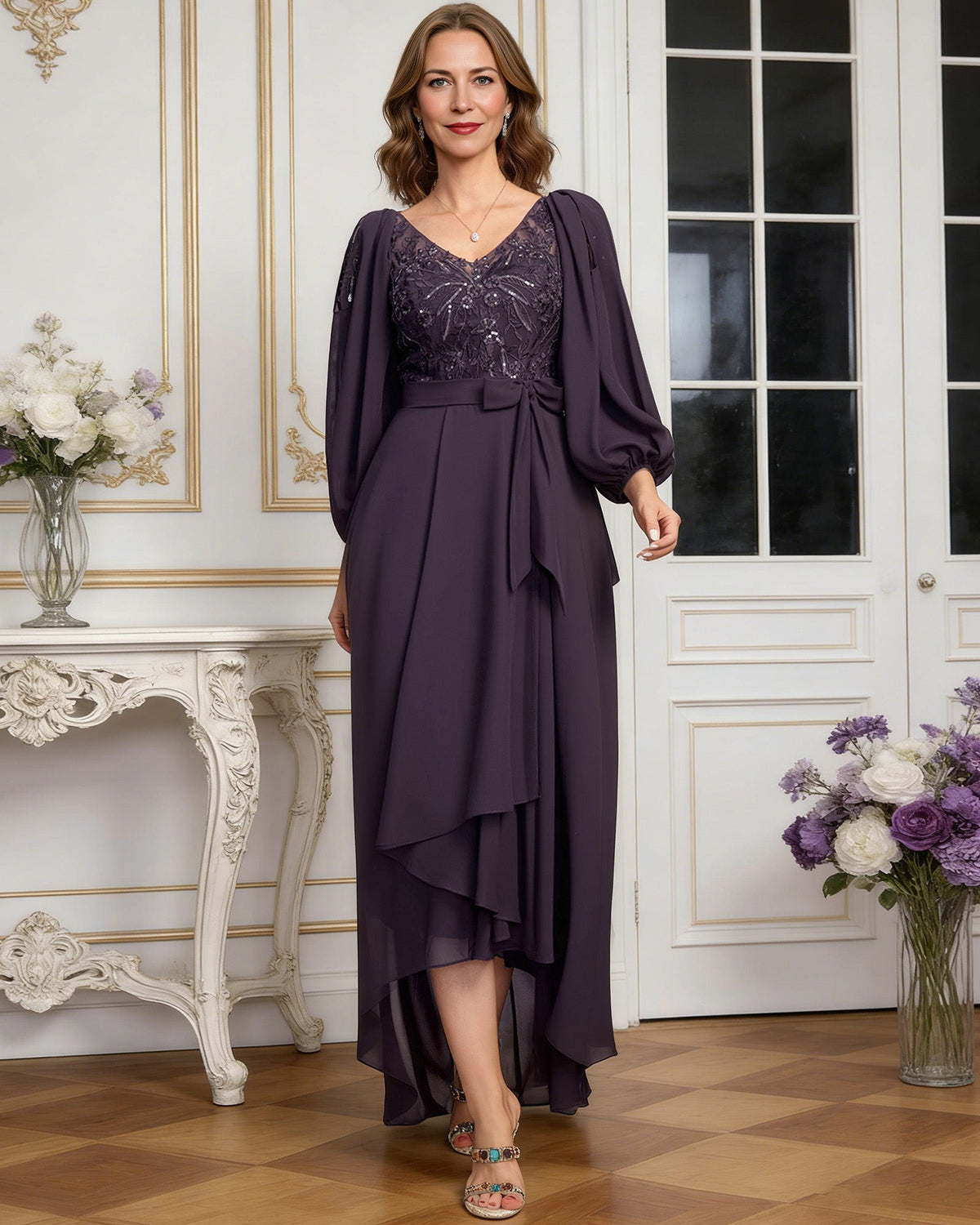 high low mother of the bride dress with lace bodice, chiffon jacket sleeves, tie waist, and layered skirt back or side view for mother of the bride occasion styling