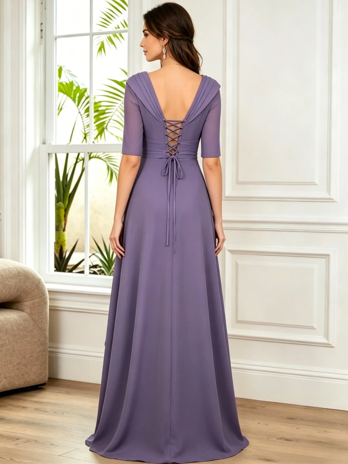 Back view of lilac chiffon V-neck A-line dress with half sleeves and lace-up detail
