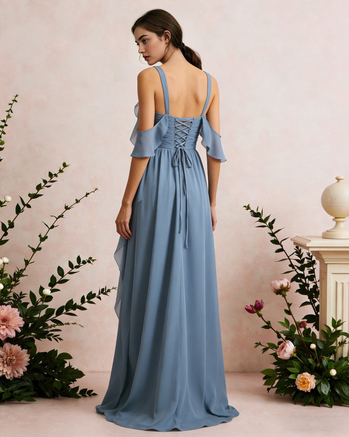 Sky-blue chiffon cold-shoulder maxi dress with open-back straps and ruched waist, rear view