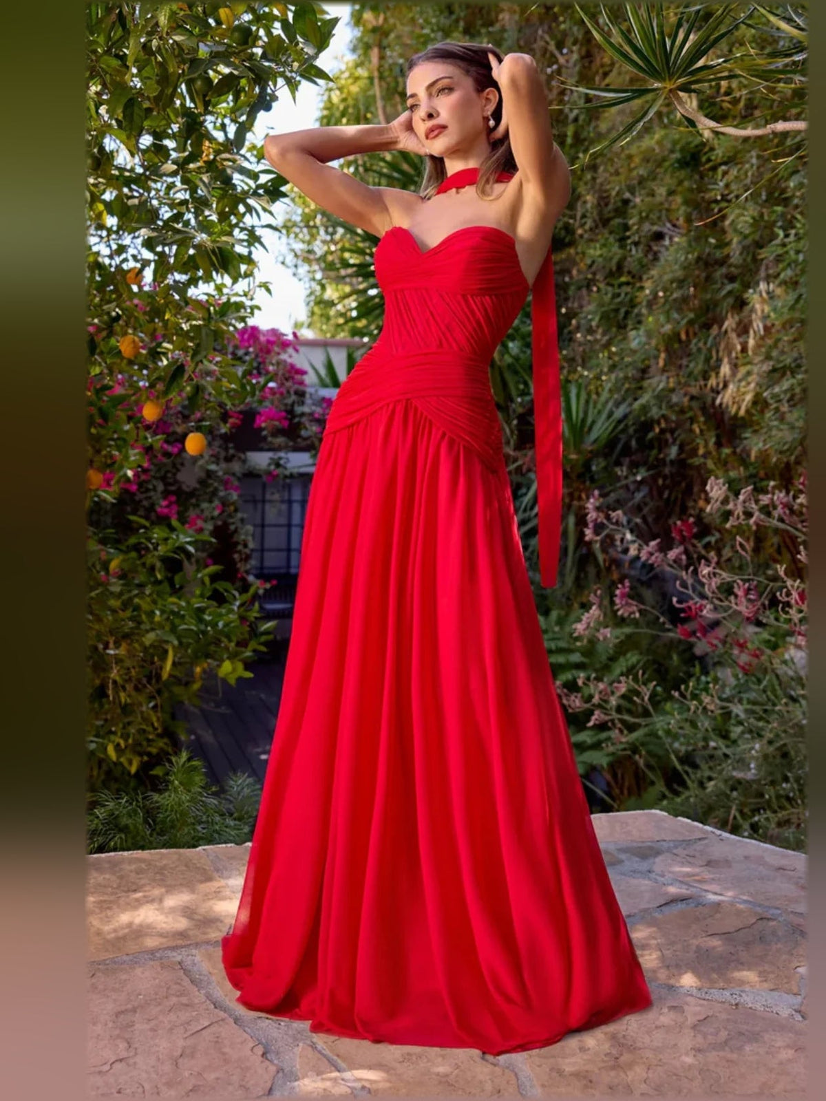 Red halter-neck sweetheart chiffon formal dress with ruched bodice and tiered flowing skirt