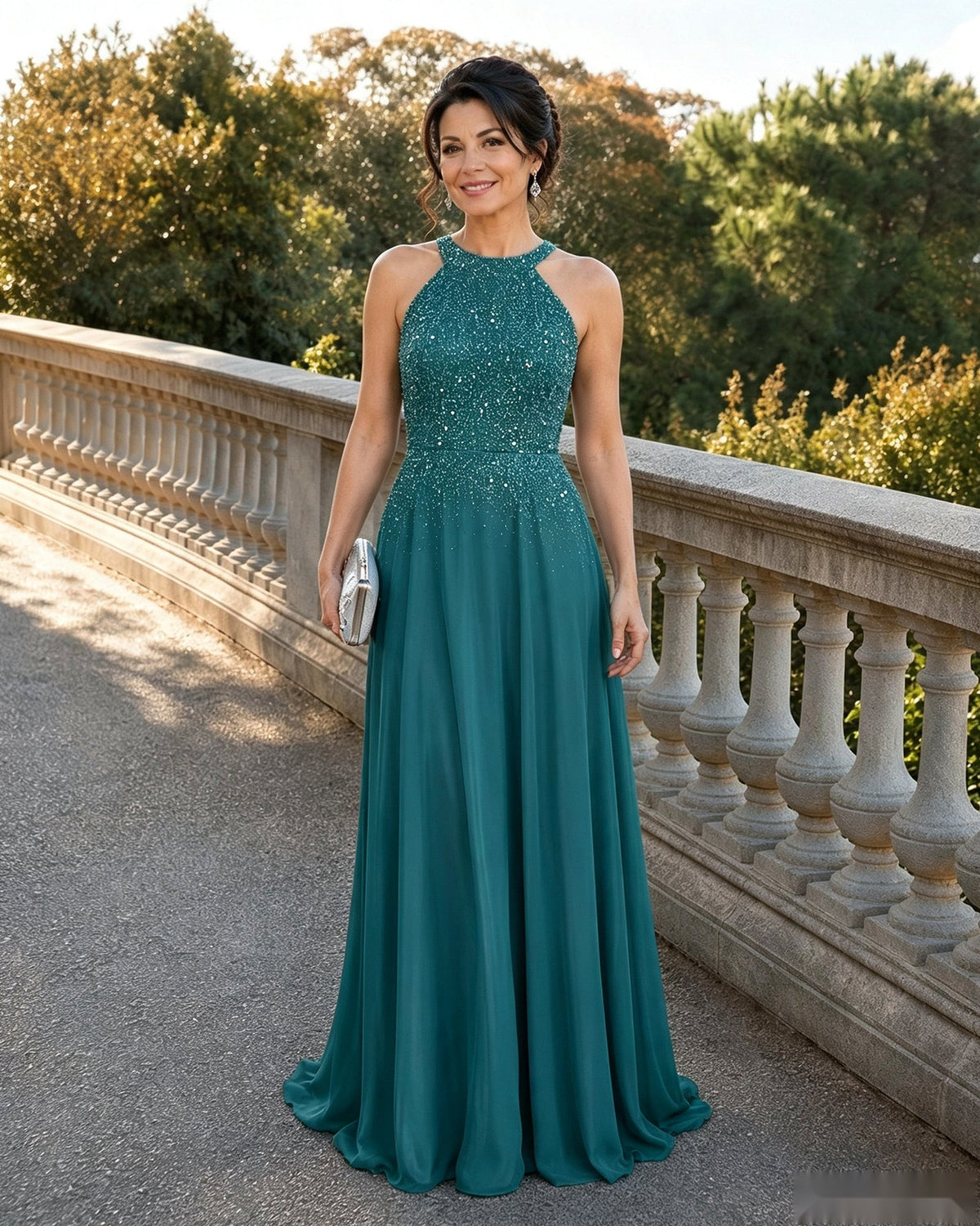 Teal halter-neck mother of the bride dress with sparkling sequin bodice and chiffon A-line skirt