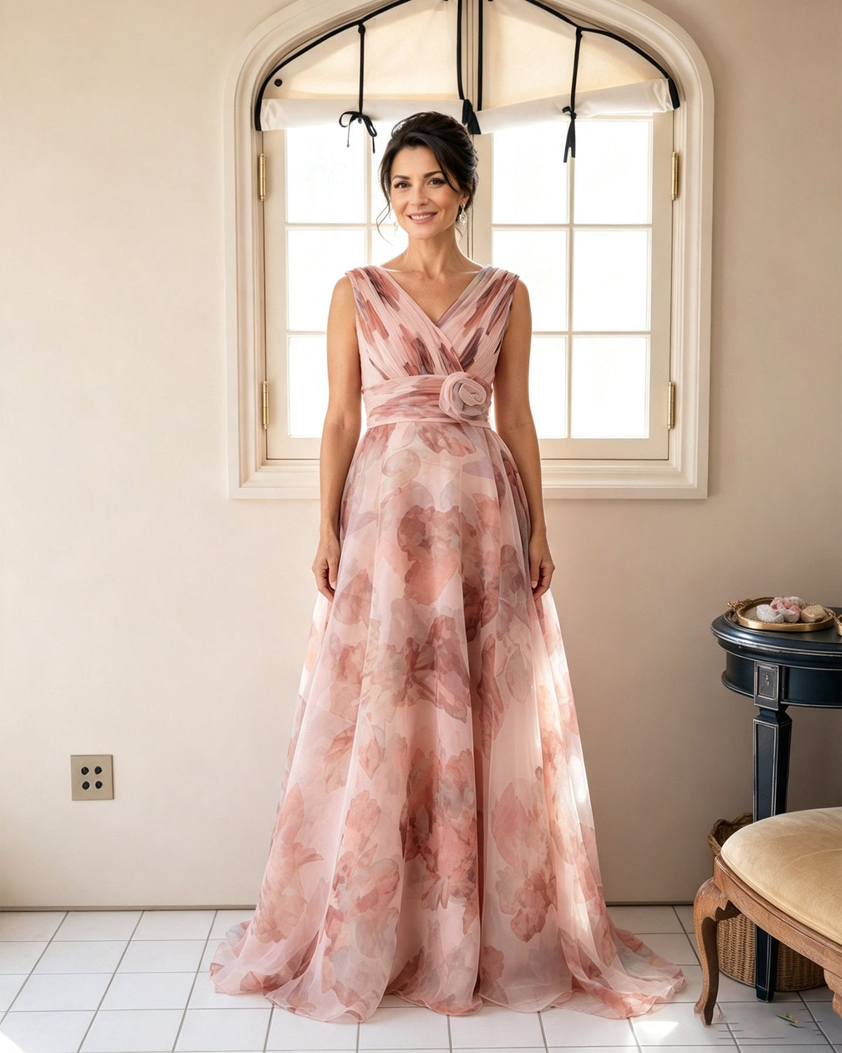 Blush pink floral chiffon V-neck mother-of-the-bride dress with rosette waist sash