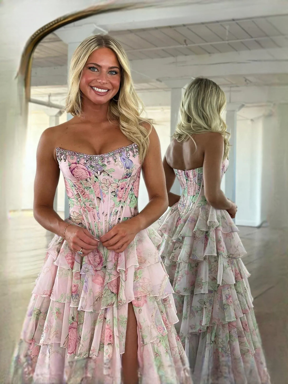 Blush floral sweetheart corset chiffon prom dress with tiered ruffles and front slit