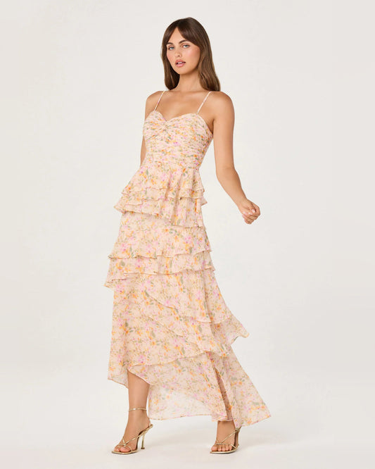 Pink and orange floral maxi dress with tiered ruffles and spaghetti straps, side view