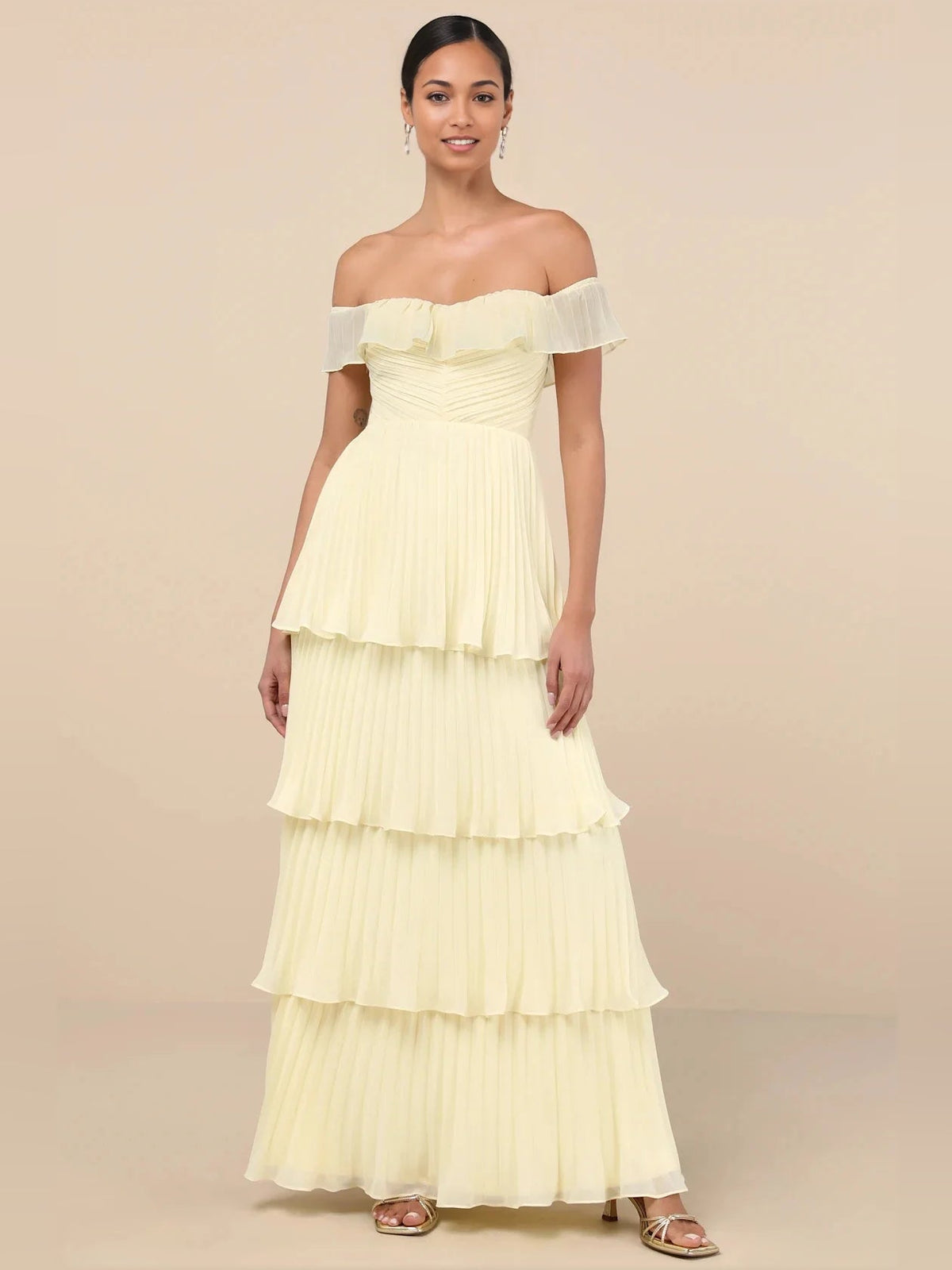 Off-shoulder tiered A-line maxi dress in pale yellow with ruffled off-shoulder neckline