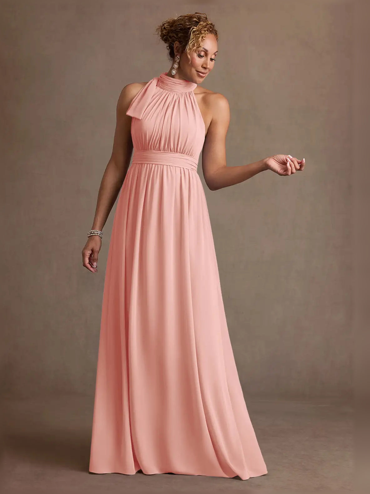 Coral-pink halter neck ruched A-line formal dress, floor-length skirt with gathered bodice