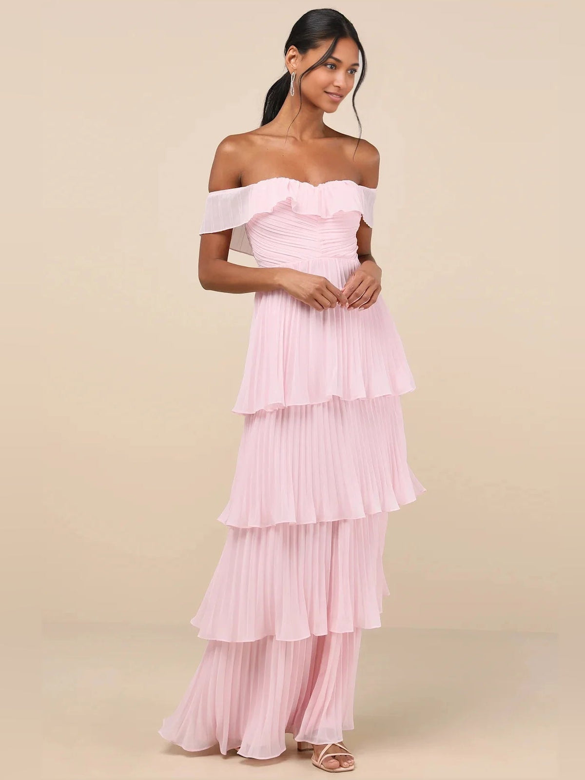 Light pink off-shoulder maxi dress with ruffled tiers and pleated bodice
