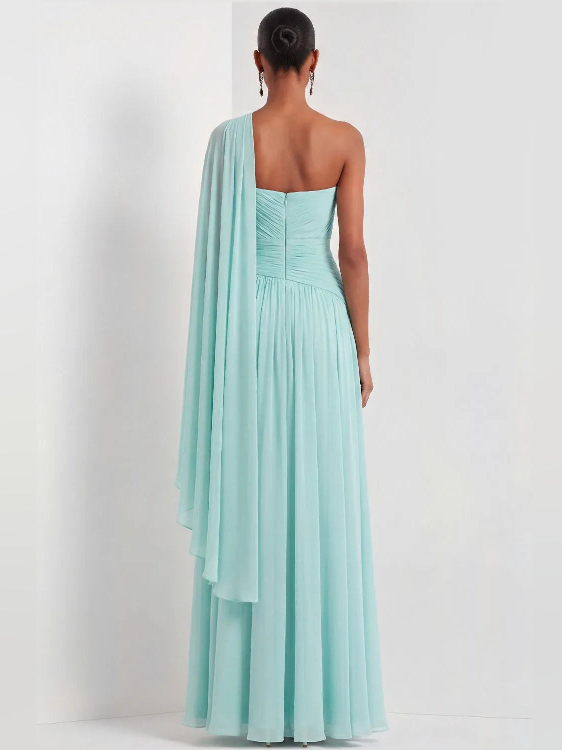 Mint green one-shoulder chiffon maxi dress with back drape and layered skirt tiers.
