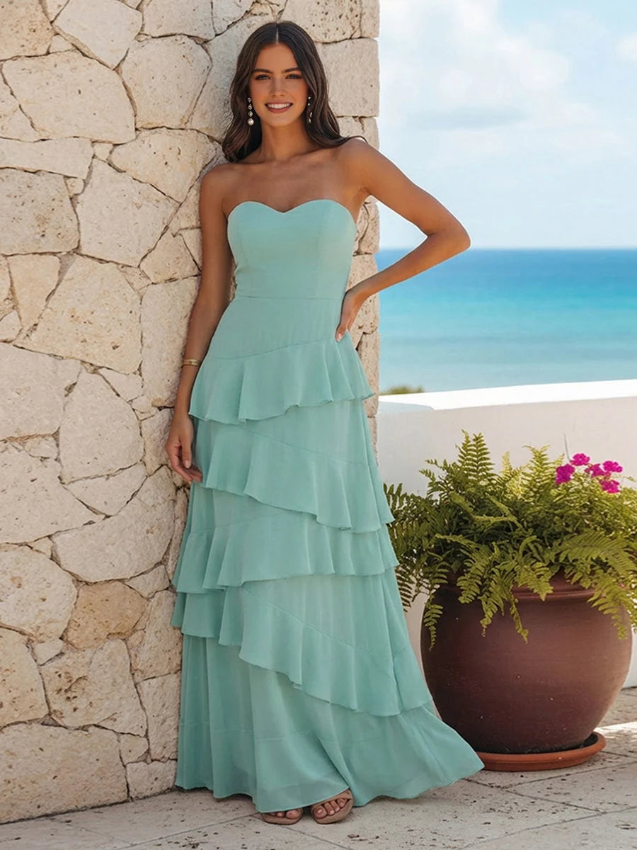 Seafoam mint strapless sweetheart maxi dress with layered ruffle tiers and peplum bodice