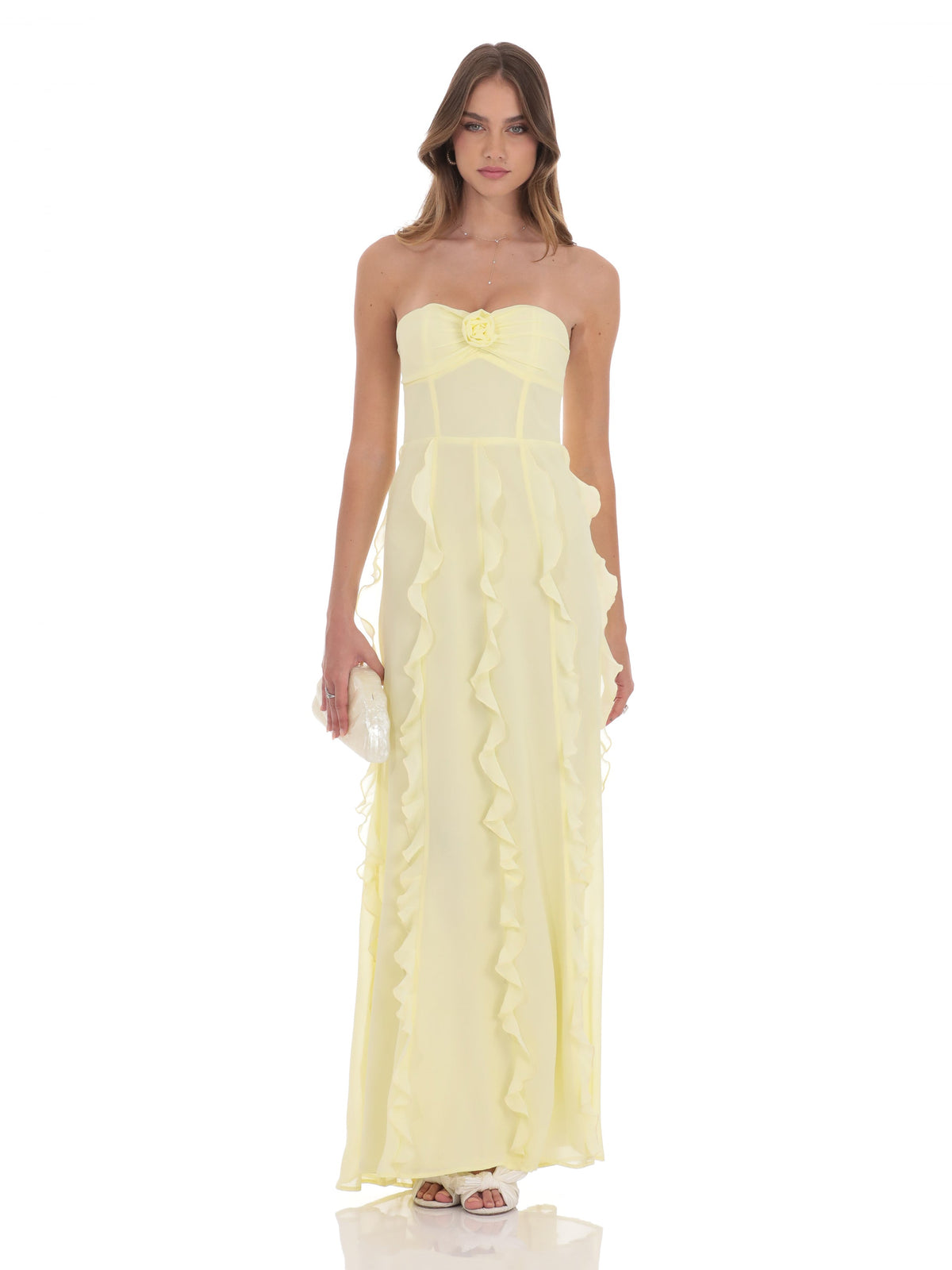 Yellow strapless A-line maxi chiffon dress, central rosette and flowing ruffle skirt