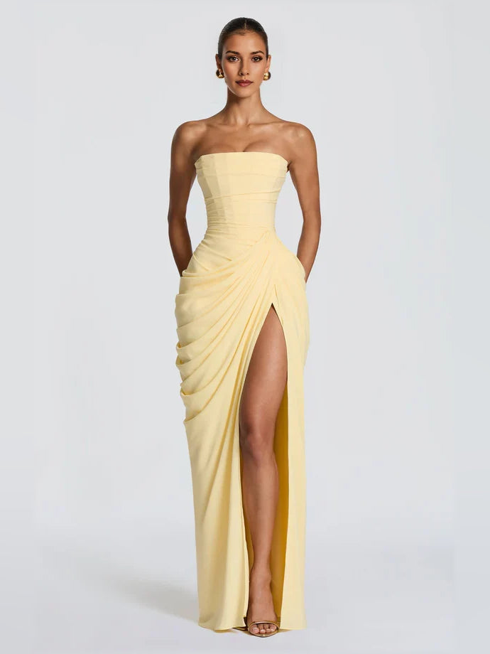 Yellow strapless ruched draped maxi chiffon dress with front leg slit and fitted waist
