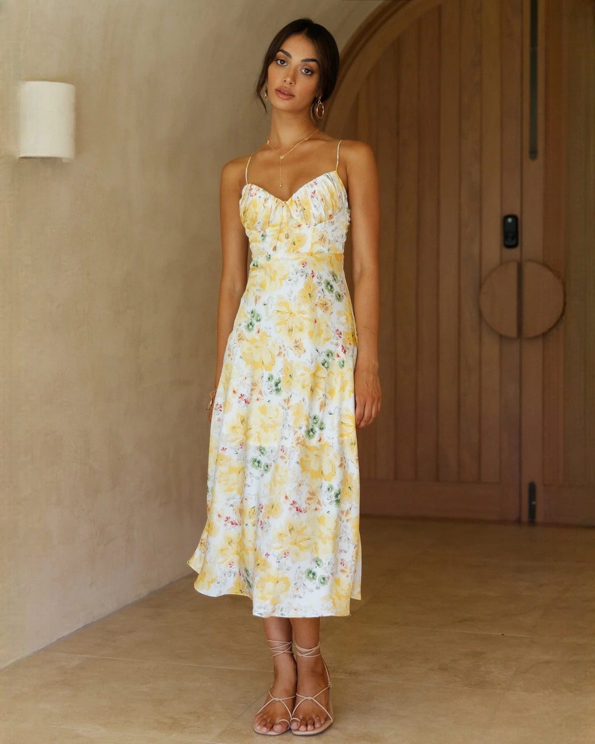 Yellow floral chiffon A-line midi dress with spaghetti straps and V-neck front