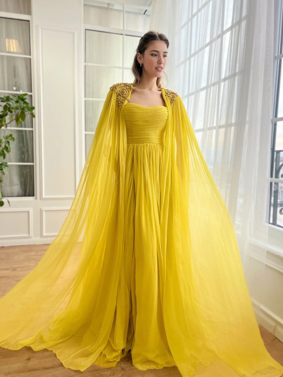 Yellow sweetheart formal dress with cape sleeves and front slit, floor-length