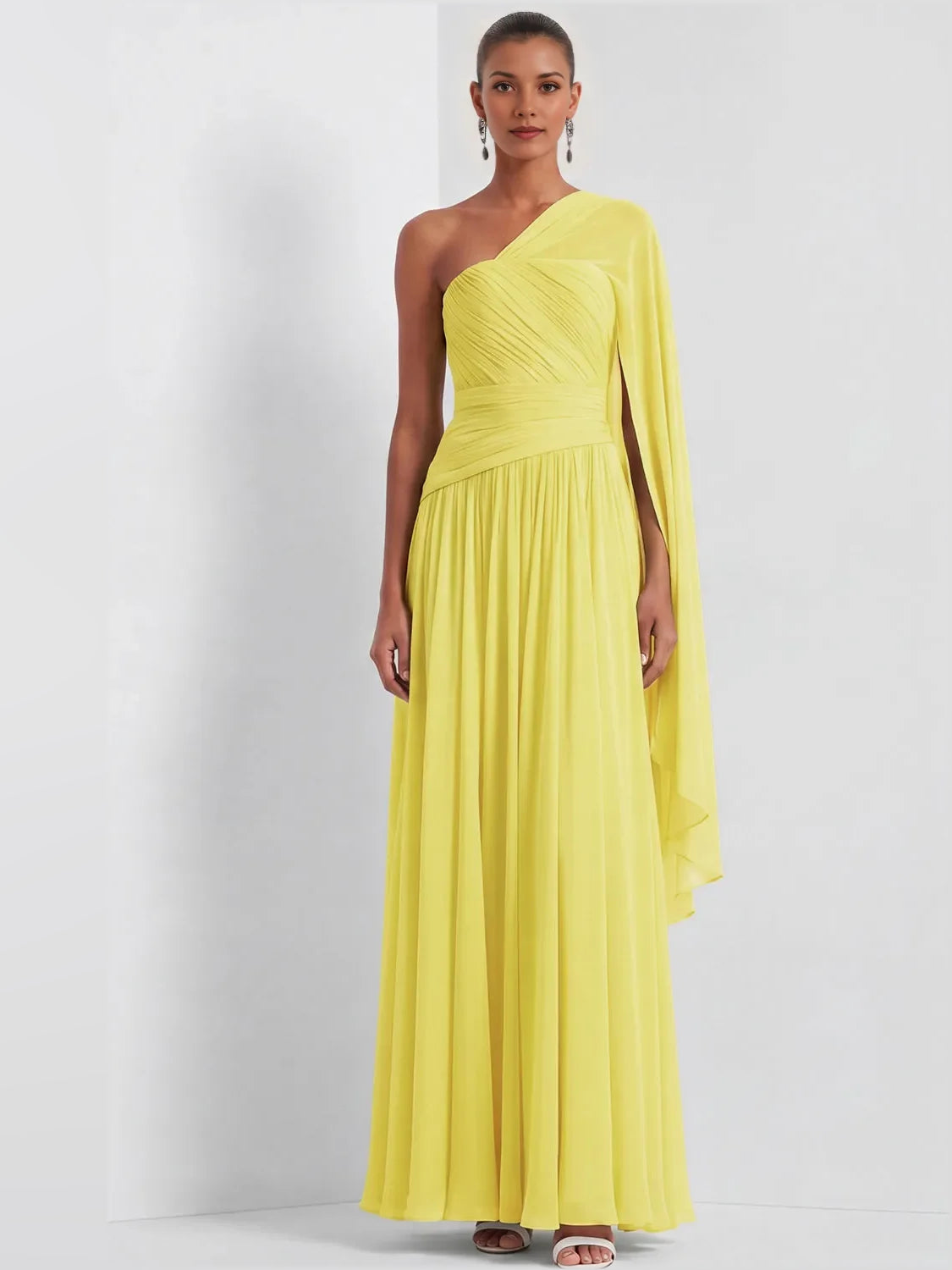 Yellow one-shoulder chiffon maxi dress with ruched texture and asymmetric draped sleeve.
