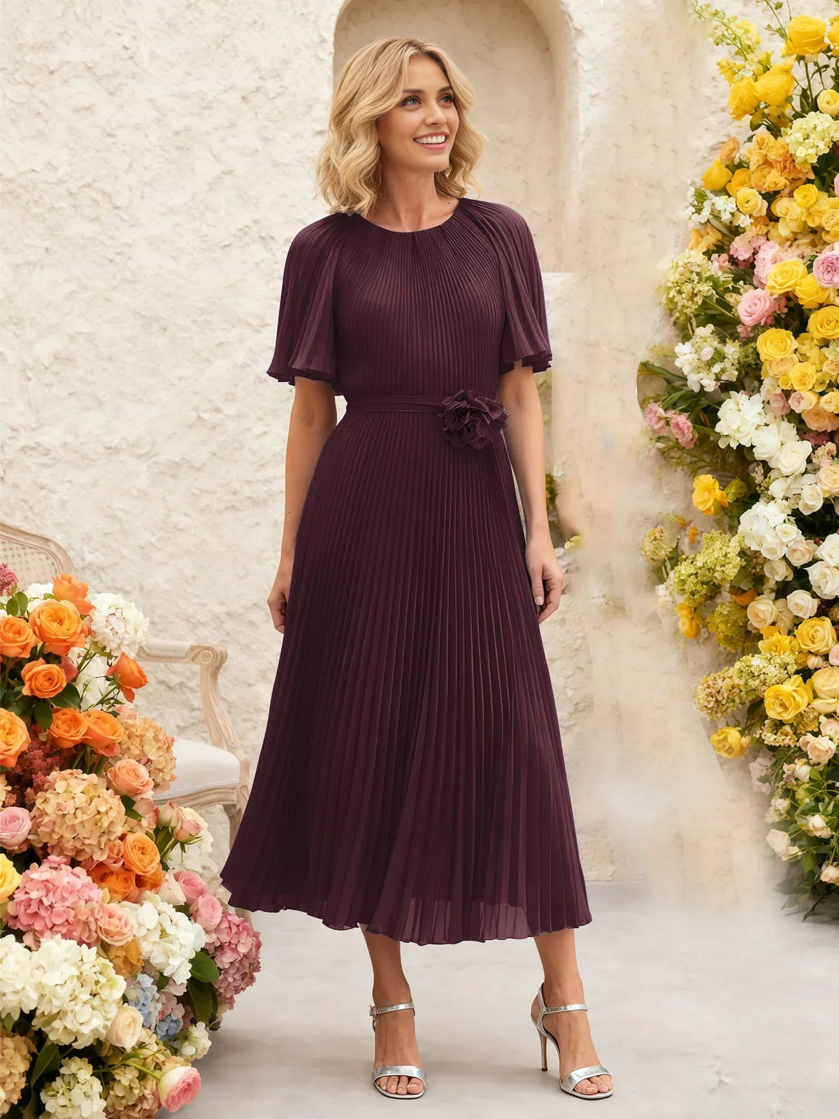 Cabernet pleated chiffon midi A-line dress with flutter sleeves and floral waist tie detail