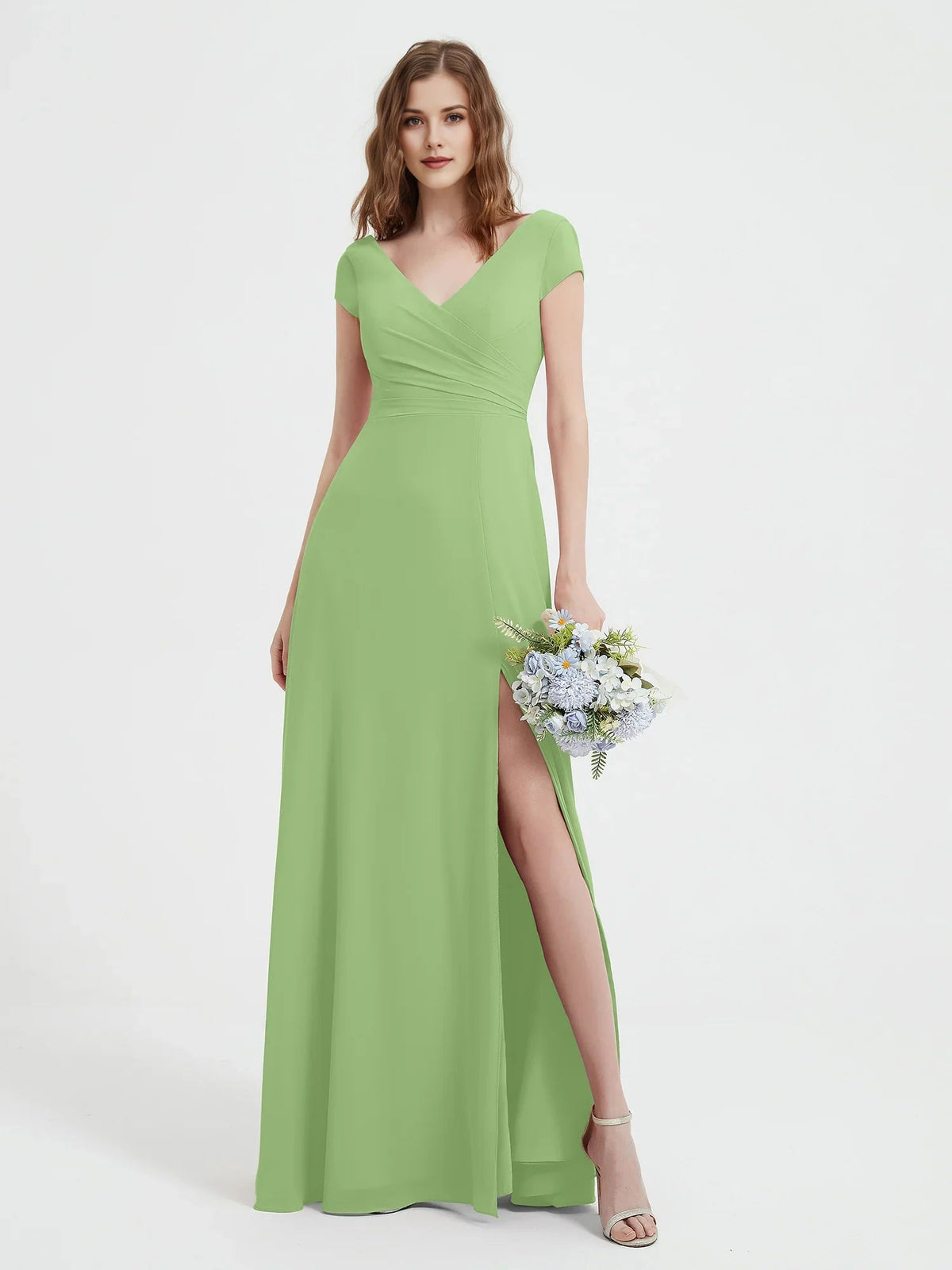 Ruched V-neck A-line maxi chiffon dress with side slit and cap sleeves, light green.