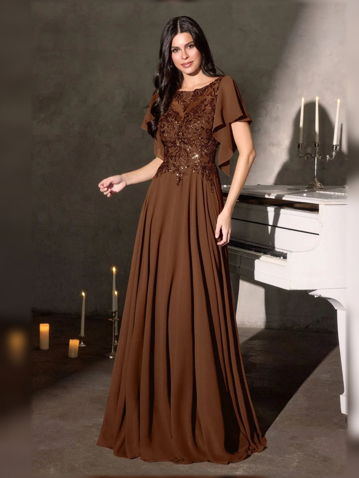 Brown chiffon A-line gown with beaded bodice and draped cape-like flutter sleeves