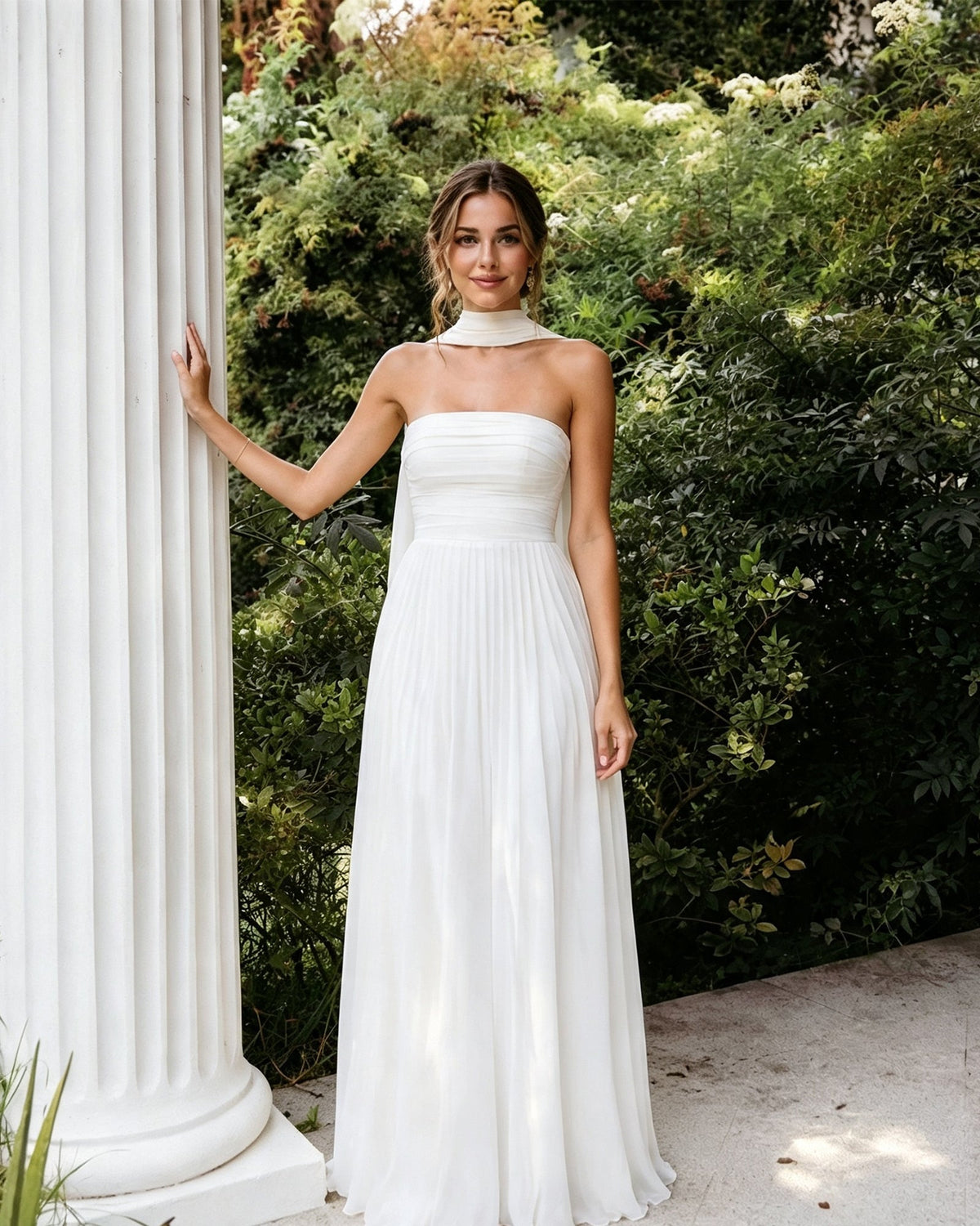 White strapless chiffon A-line bridesmaid dress with pleated bodice and neck scarf collar