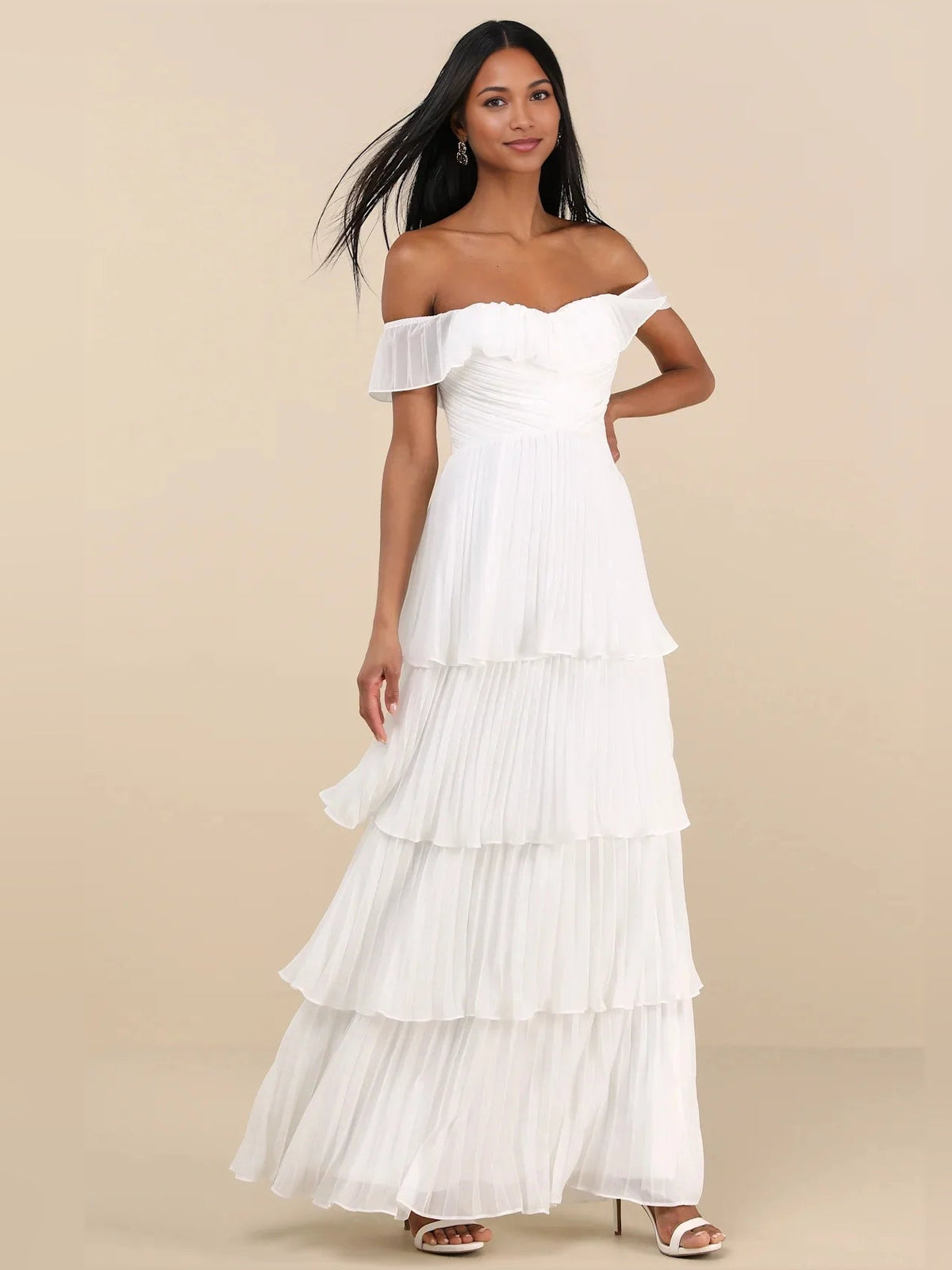 White off-shoulder maxi dress with layered ruffle tiers and pleated bodice