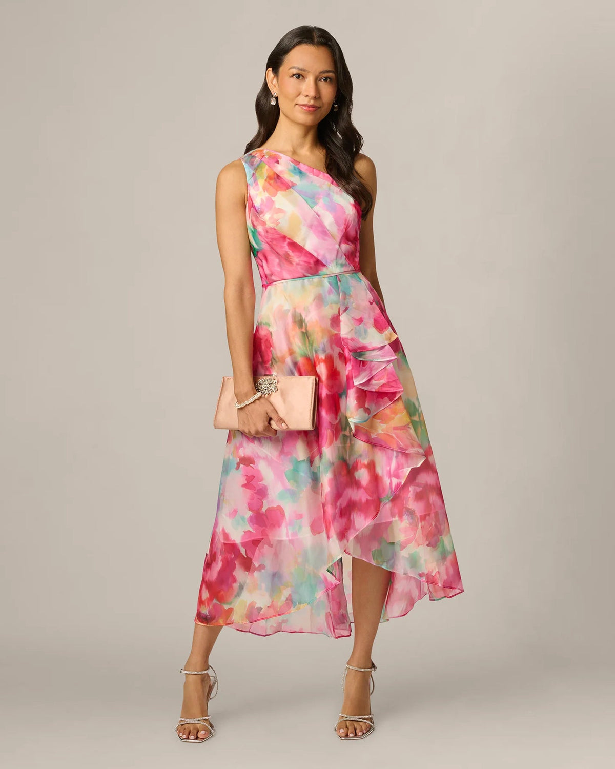 One-shoulder A-line midi dress with side draped ruffle and pink floral watercolor print.