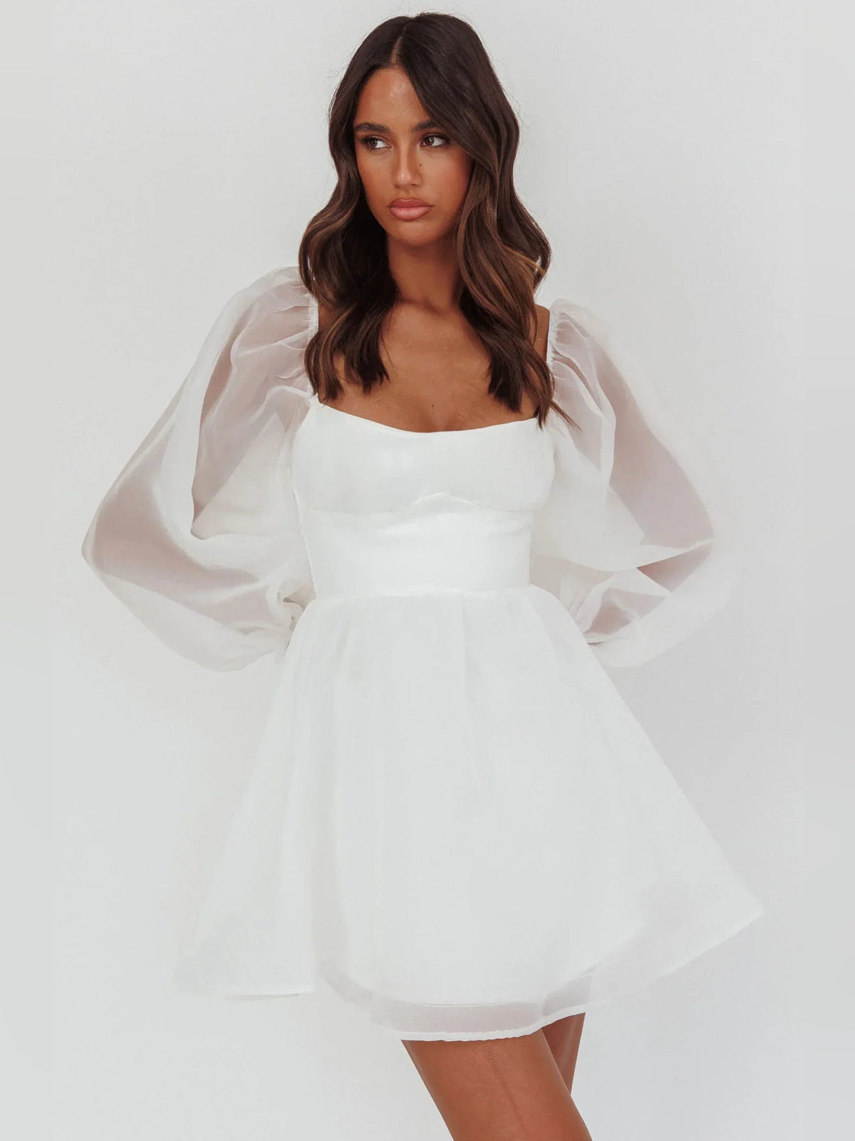 White satin sweetheart mini homecoming dress with square neckline and puff sleeves