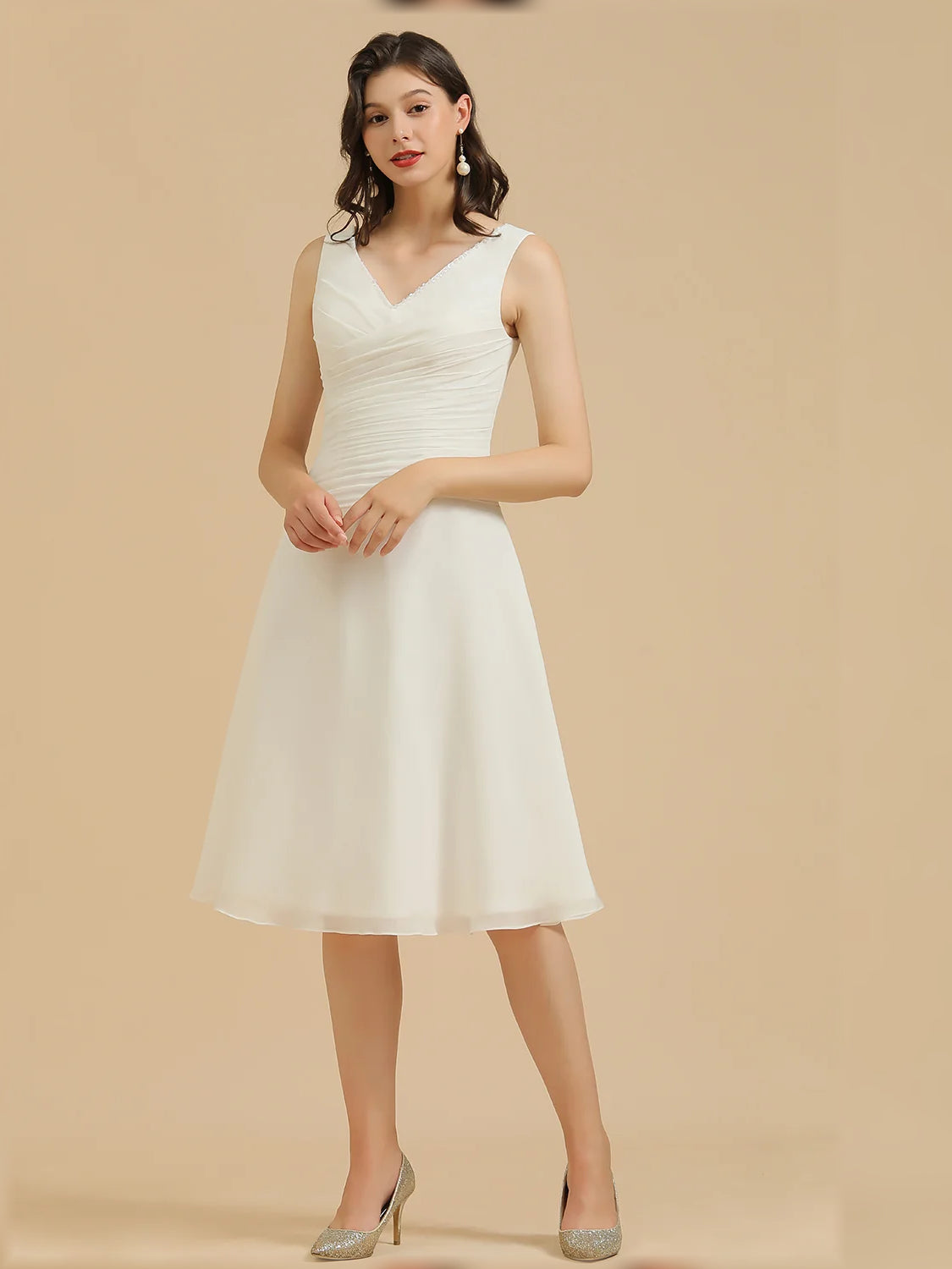 White ruched V-neck A-line mini chiffon dress, sleeveless standing pose