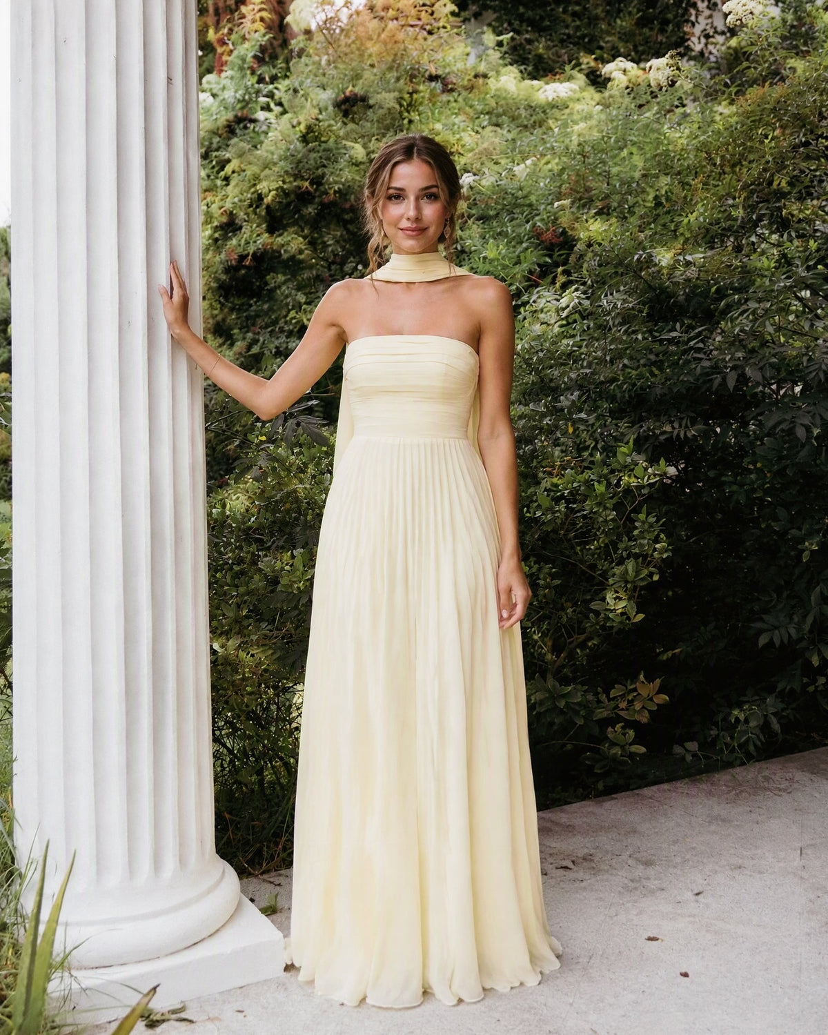 Ivory strapless chiffon bridesmaid dress with pleated bodice and A-line skirt, neck scarf