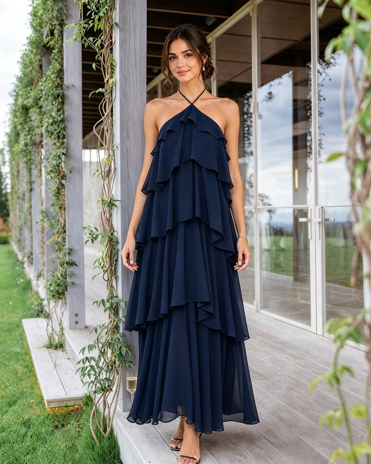 Navy halter-neck tiered chiffon bridesmaid dress with cascading ruffle overlay tiers