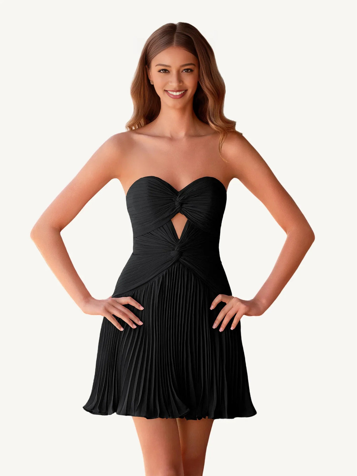 Black strapless sweetheart mini dress with ruched pleated A-line skirt and bow detail