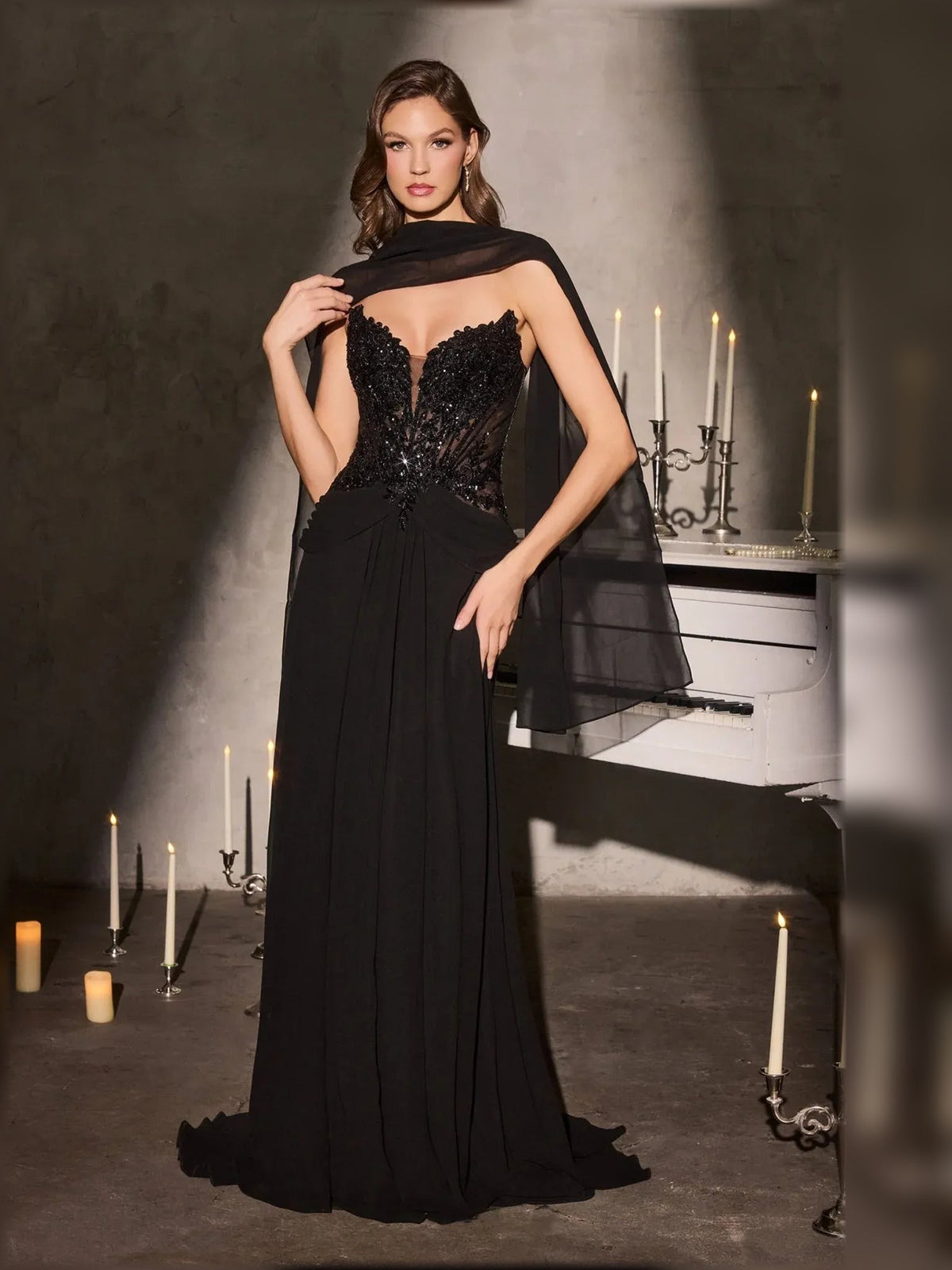 Black strapless A-line floor-length chiffon dress with beaded bodice and drape wrap