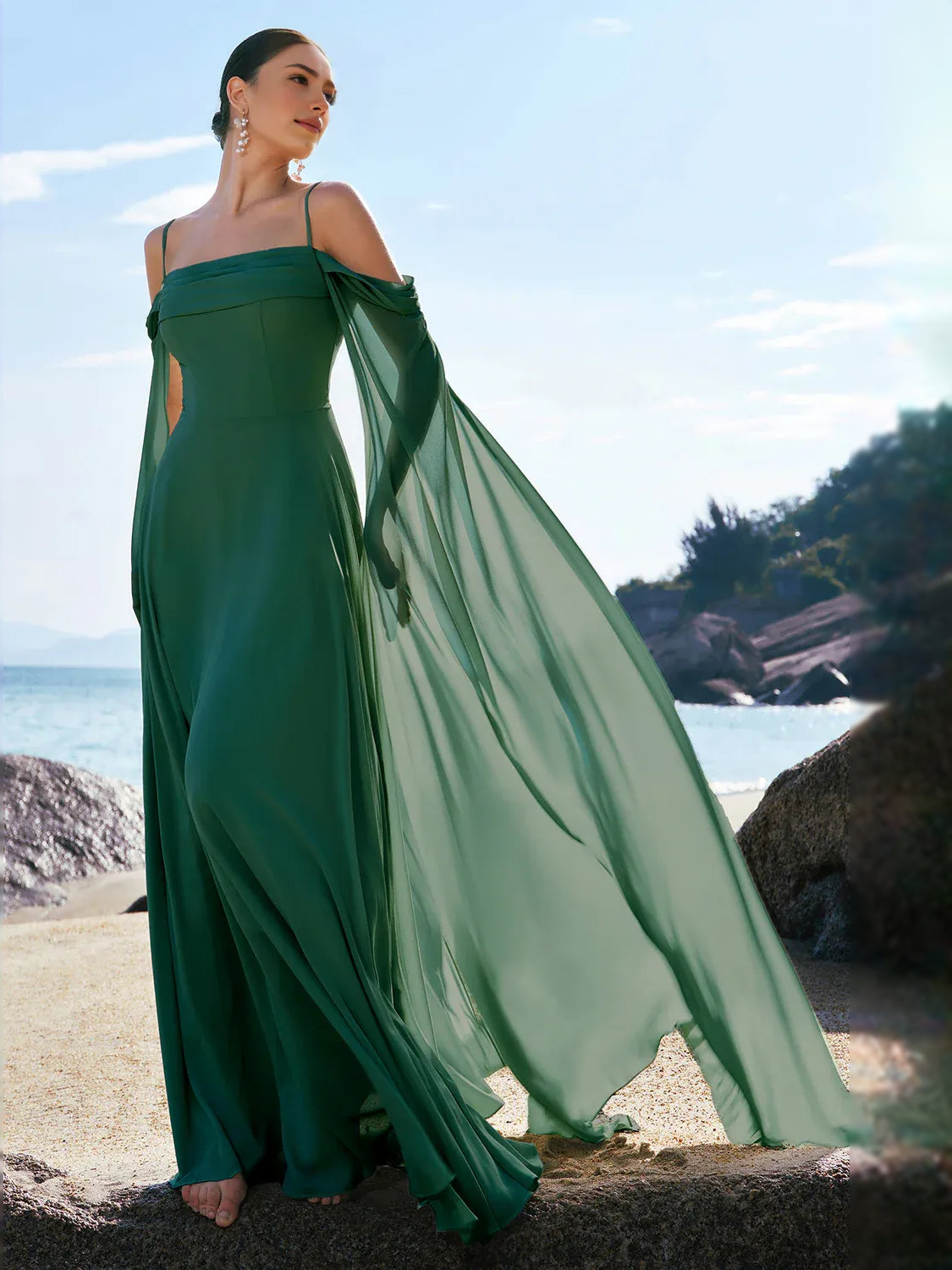 Dark green off-shoulder A-line chiffon bridesmaid dress with flowing sheer drape