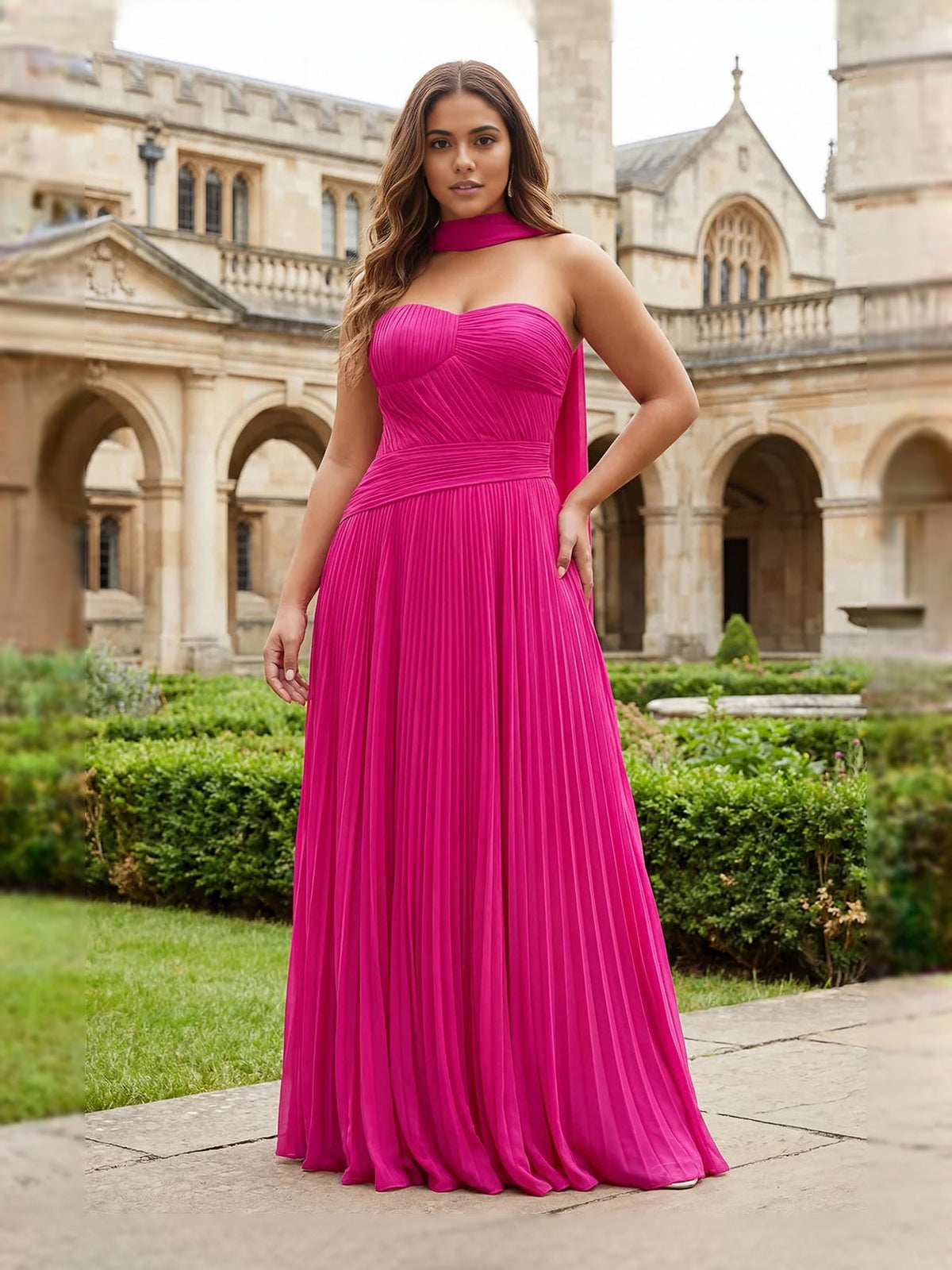 Fuchsia strapless sweetheart A-line maxi prom dress with flowing pleated chiffon