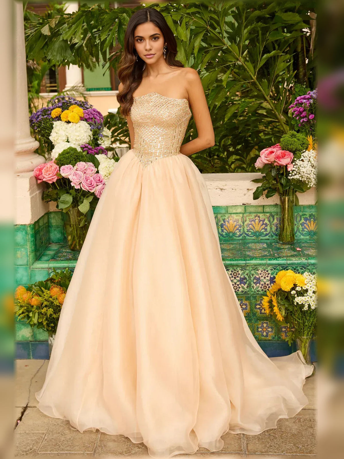Gold strapless beaded evening dress with full floor-length tulle skirt