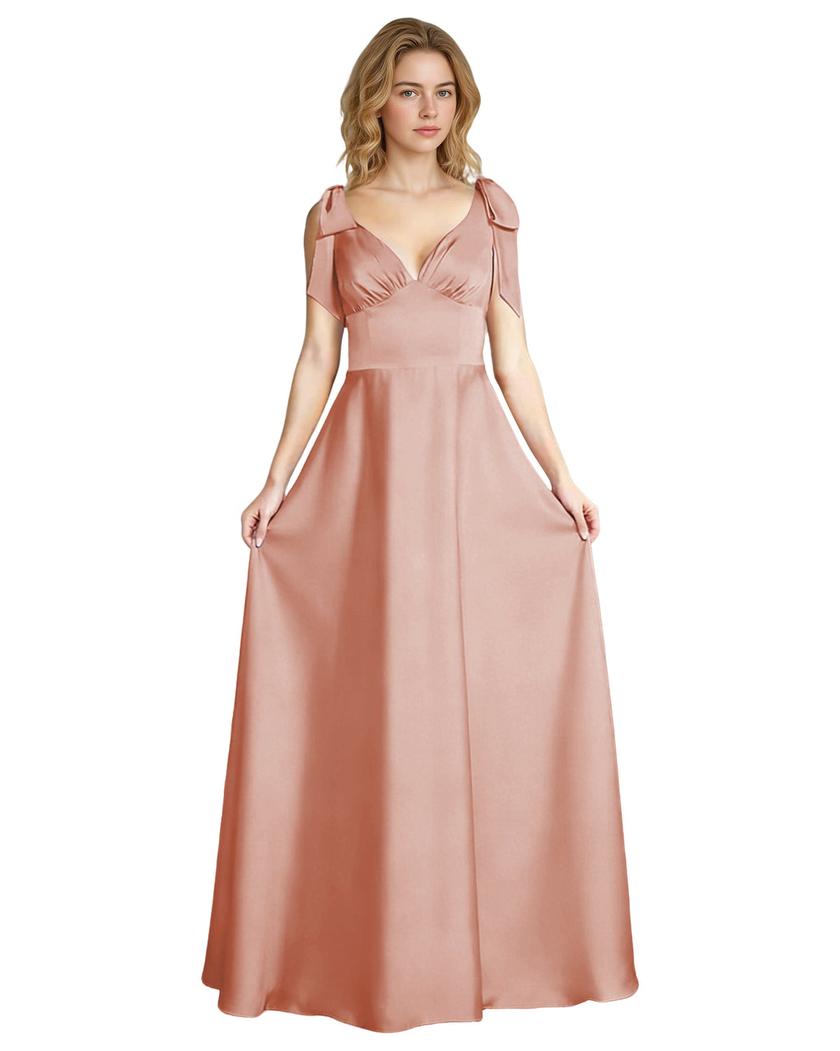 Blush pink satin V-neck bridesmaid dress with bow shoulder straps, empire waist, full skirt.